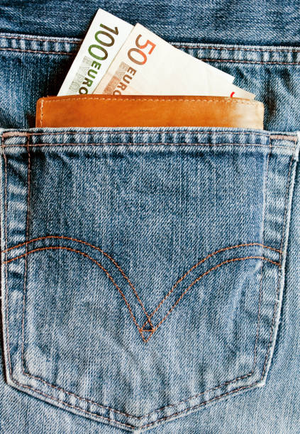 istock Money in pocket concept 651210118