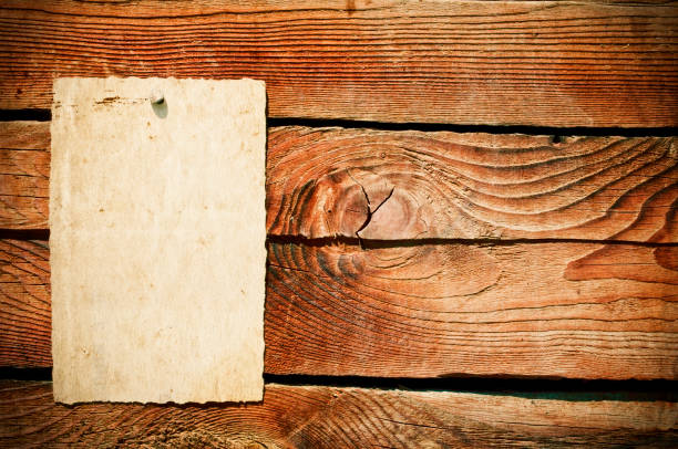 istock Grunge paper on wooden background 651210262