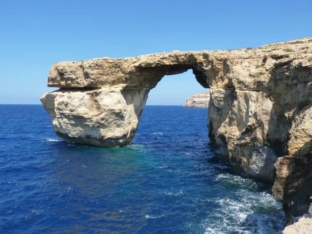 istock Azure Blue Window in Gozo Malta showing Rock Formation. 651222694