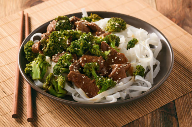 istock Chinese food - beef prepared with broccoli and rice noodles. 651230186