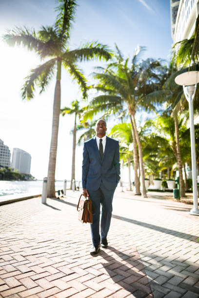 istock businessman make a phone call in miami 651235982