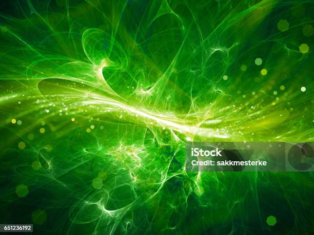 Green Glowing High Energy Plasma Field In Space With Particles Stock Photo - Download Image Now