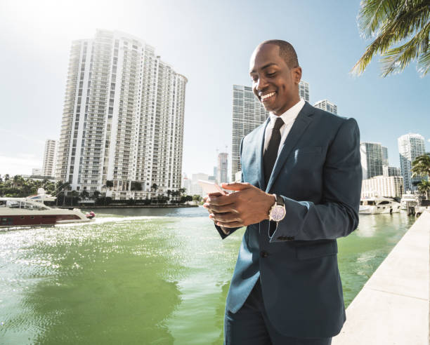 istock businessman make a phone call in miami 651247398