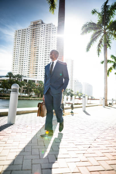 istock businessman make a phone call in miami 651247884