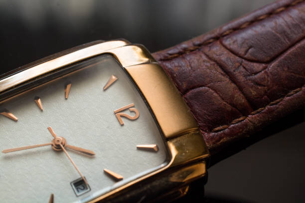 istock Golden Men's Wristwatch on a Black Background. 651247944