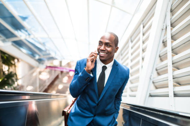 istock businessman make a phone call in miami 651251732