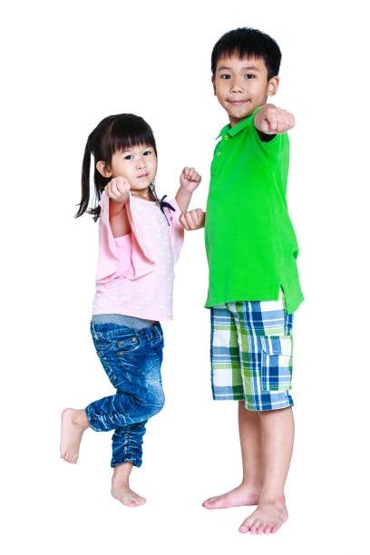 istock Happy asian children posing, isolated on white background. 651254834
