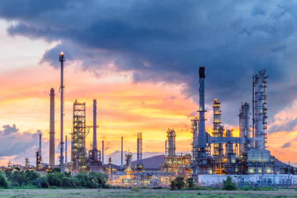istock Oil refinery at sunrise 651254944