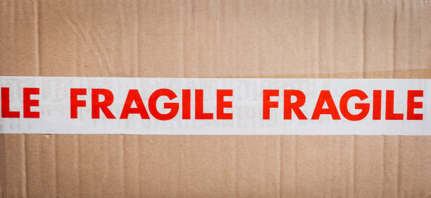 istock Carboard box with fragile tape 651254962