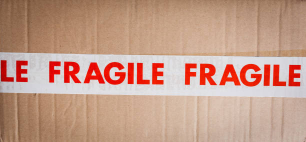 istock Carboard box with fragile tape 651254982