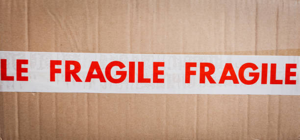 istock Carboard box with fragile tape 651254996