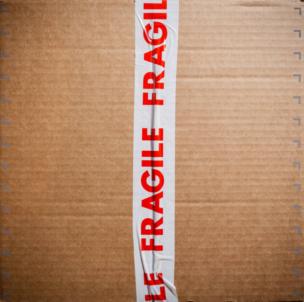 istock Carboard box with fragile tape 651255024