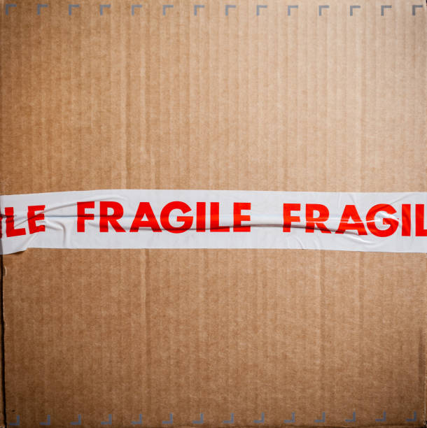istock Carboard box with fragile tape 651255042