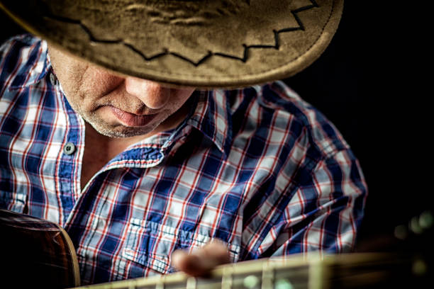 istock Songwriter and Guitar Player 651265548