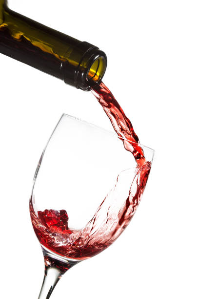 istock bottle pouring red wine in a glass 651285930