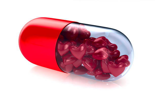 istock capsule with heart on white background. Isolated 3D image 651294324