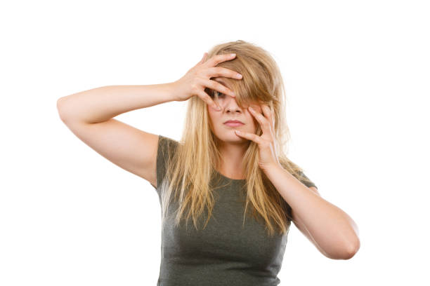 istock Ashamed embarrassed blonde woman with hands on face 651312522