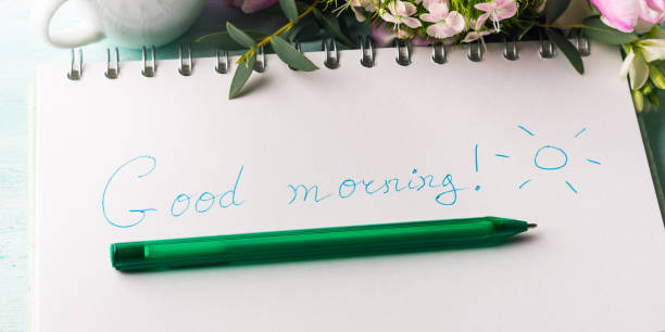 istock Wish good morning on notebook page and coffee 651316396
