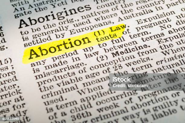 Abortion Dictionary Definition Highlighted Stock Photo - Download Image Now - Abortion, Law, Book