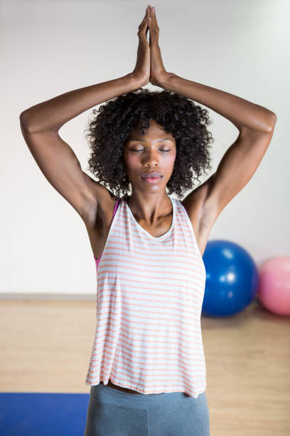istock Woman performing yoga 651327478