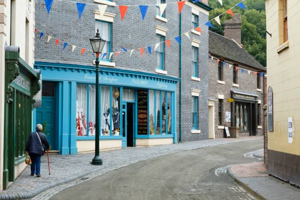 Traditional victorian town shops along a historic street in Blists Hill Museum, Ironbridge, Shropshire, UK