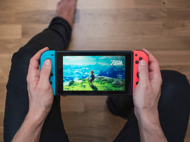 nintendo switch neon game console - switch imagens e fotografias de stock