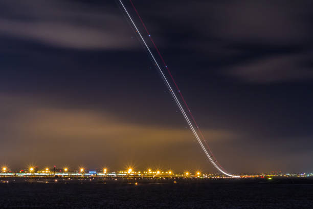 istock Fence with barbed wire, restricted area and starting plane 651337842