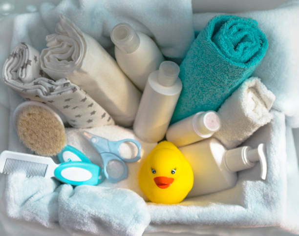 baby equipment Baby accessories for bathing and hygiene with rubber duck group of babies stock pictures, royalty-free photos & images