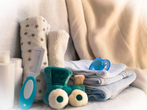 istock baby clothes and accessories with toy 651338520