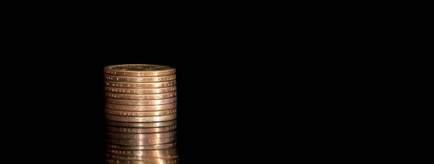istock Stack of coins on black. Business concept. 651341788