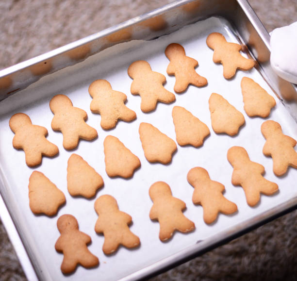 istock Christmas cookies in baking pan 651342144