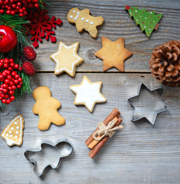 istock Christmas cookies on wooden background 651342164