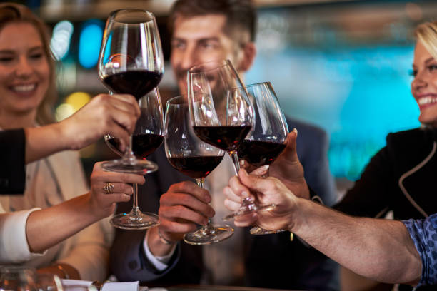 istock People celebrating in the restaurant 651345292