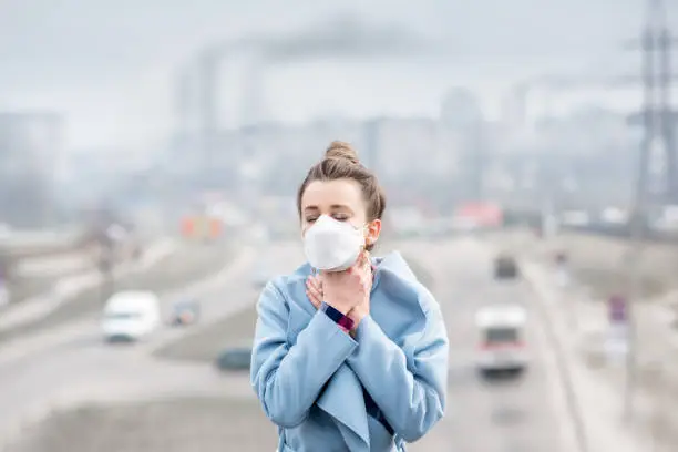 Photo of Woman with mask in the city