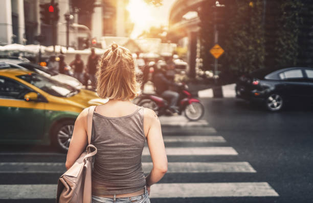 istock Young woman exploring streets of Bangkok 651353732