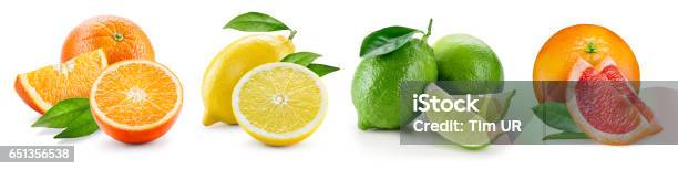 Fruit Compositions With Leaves Isolated On White Background Orange Lemon Lime Grapefruit Collection Stock Photo - Download Image Now