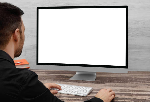 istock Man looking at computer monitor 651357020