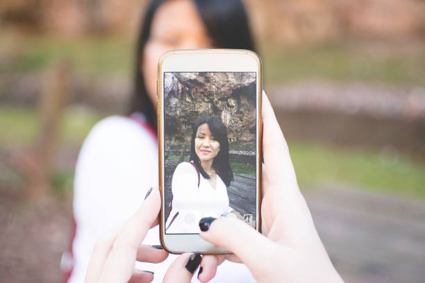 istock Friends taking photos 651357338