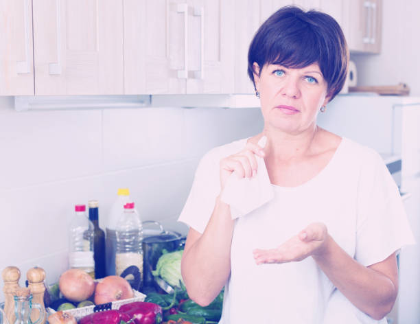 istock senior woman portrait sad 651386718