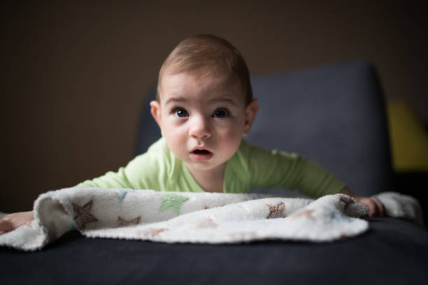 istock Cute baby posing on the blanket 651392062