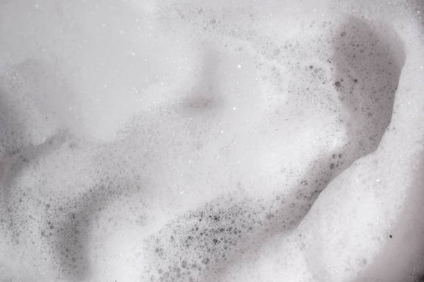 istock abstract background of white foam and bubbles. 651394356