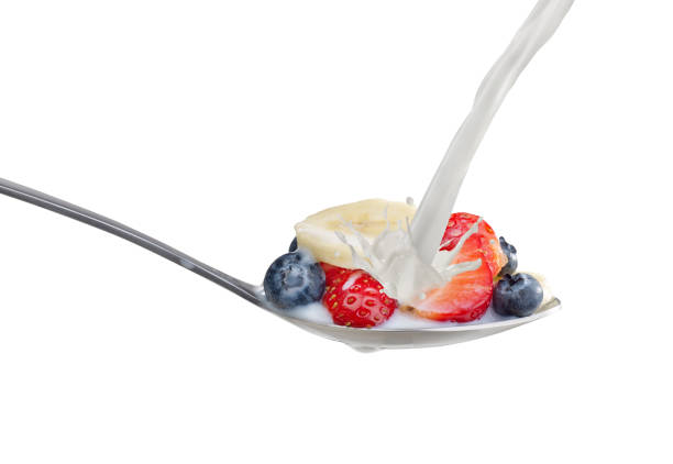 istock Spoon with milk and cereals 651395982