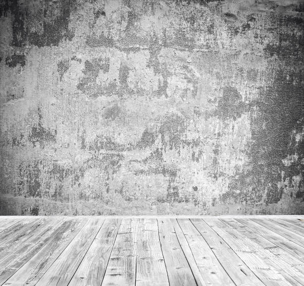 istock Empty room with white wall and wooden floor 651448050