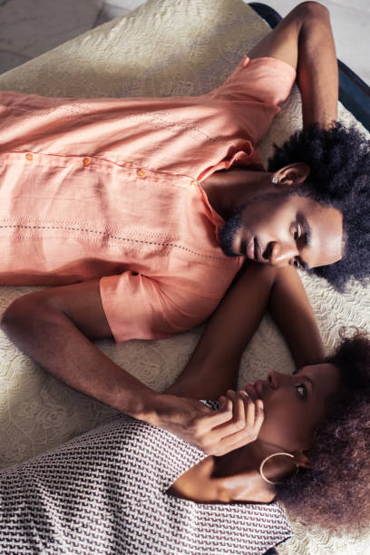 istock young couple lying on bed at home 651449238