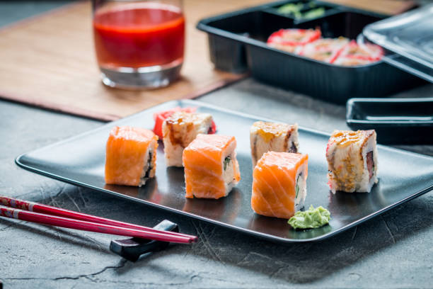 istock Set of salmon eel sushi rolls 651450084
