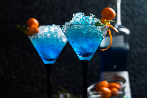 istock Blue cocktail in martini glasses 651452298