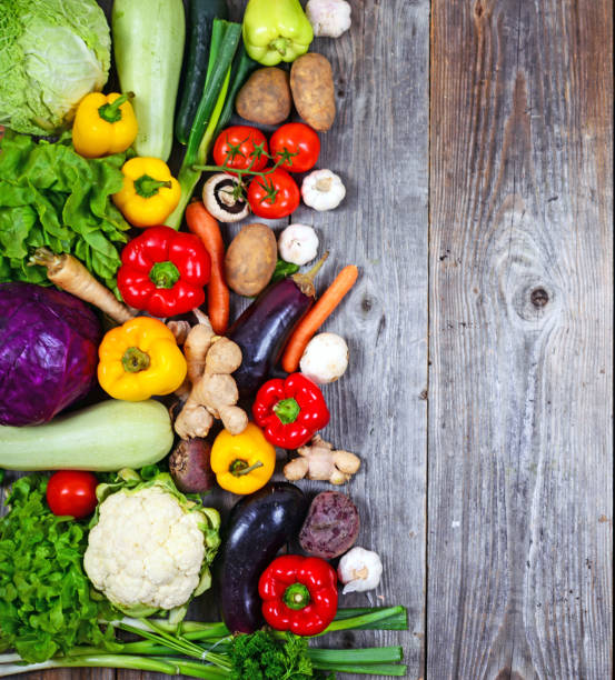 istock Huge group of fresh vegetables on wooden  table - High quality studio shot 651456774