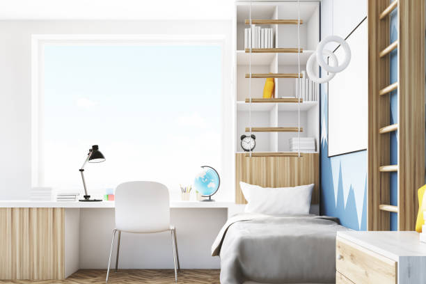 istock Side view of kid’s room with table 651479192
