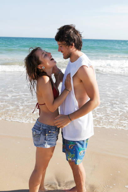 istock White couple on the beach 651489322