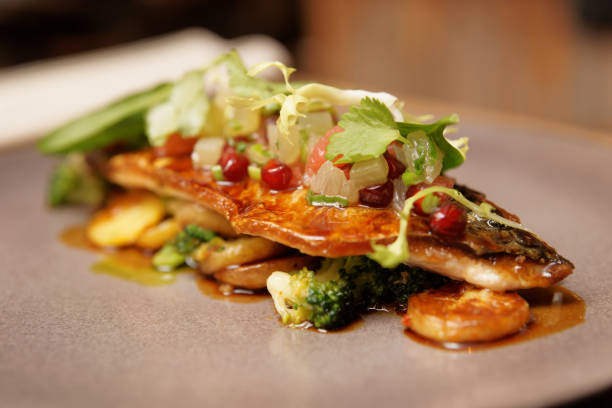 istock Fish fillet with vegetables and potatoes 651496824